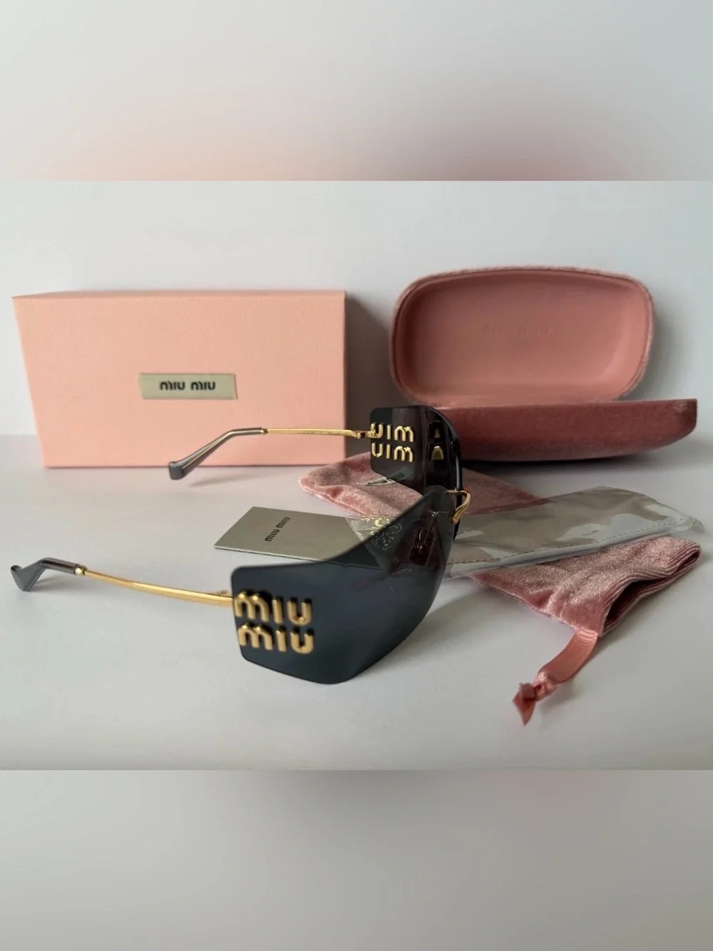 Miu Miu OMU 54YS Gold/ Dark Gray Lense Sunglasses